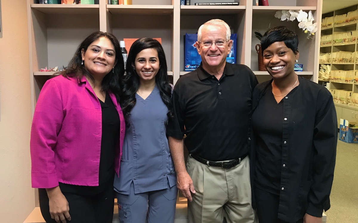Dr. Sonny Shaddix with dental office colleagues